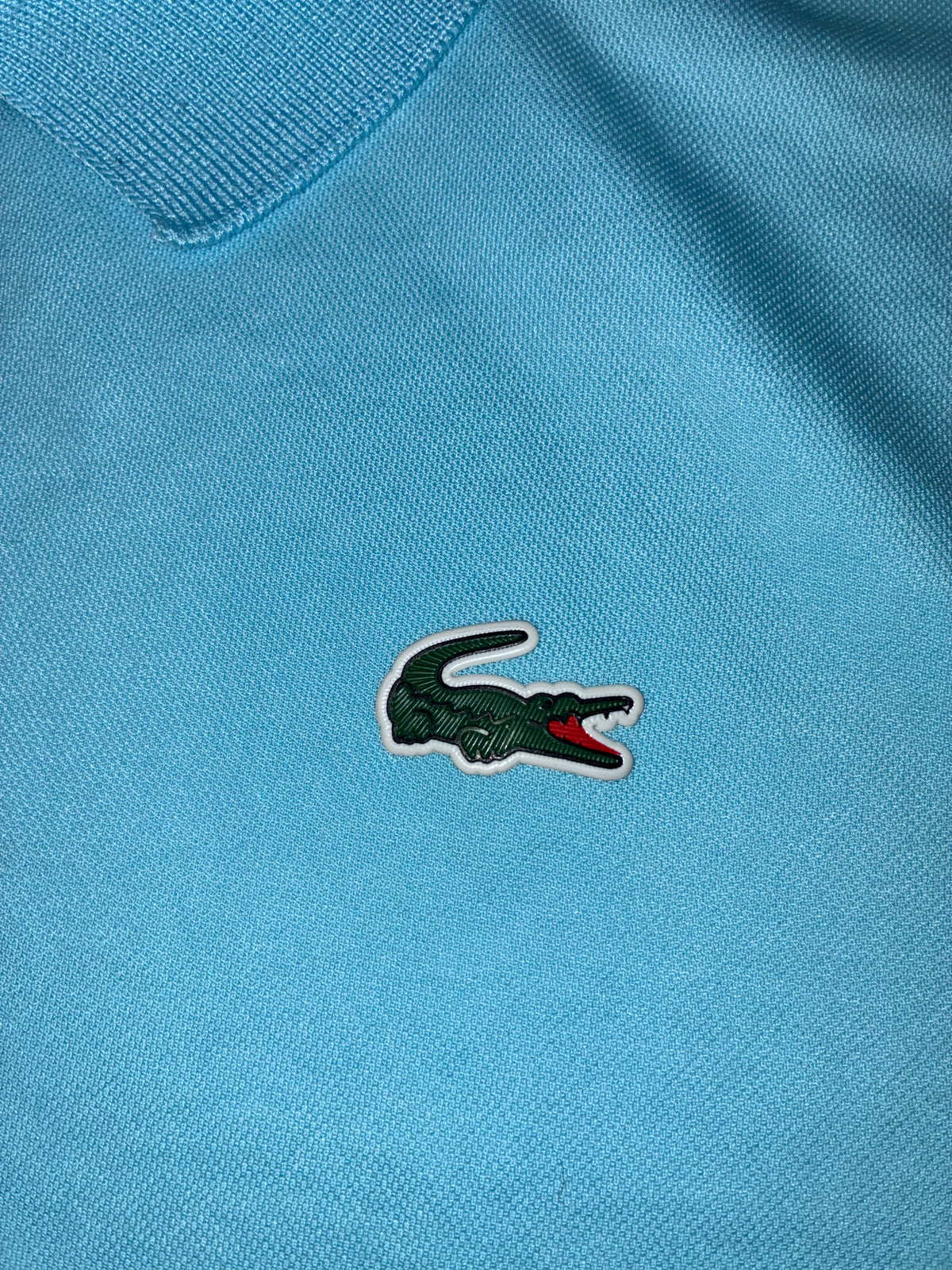 babyblue Lacoste polo {S}