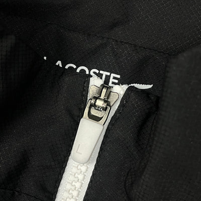 black/white Lacoste windbreaker {XS}