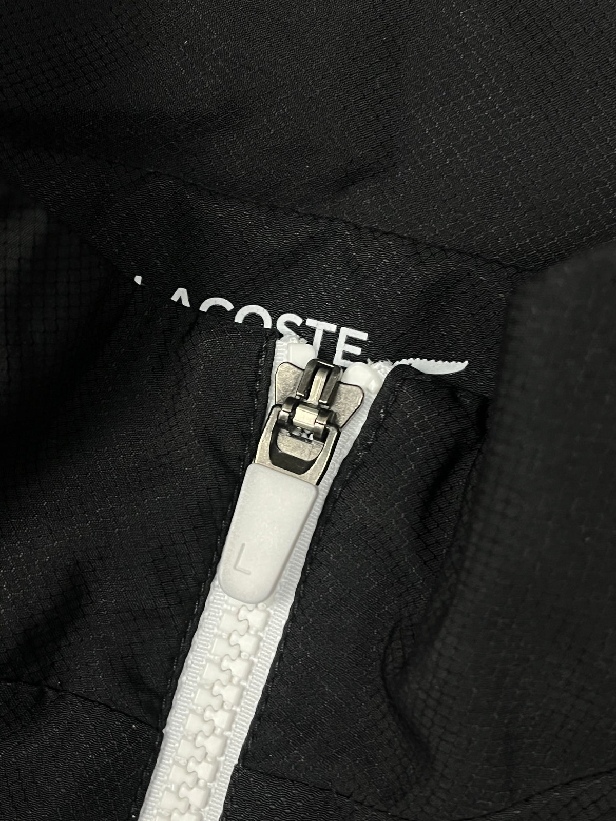 black/white Lacoste windbreaker {XS}