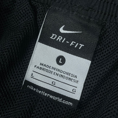 vintage Nike trackpants {L}