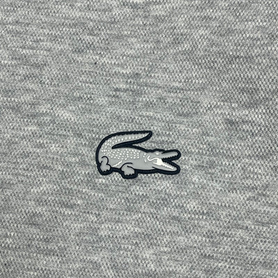 grey Lacoste trackjacket {S}