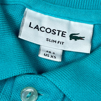 babyblue Lacoste polo {XS}