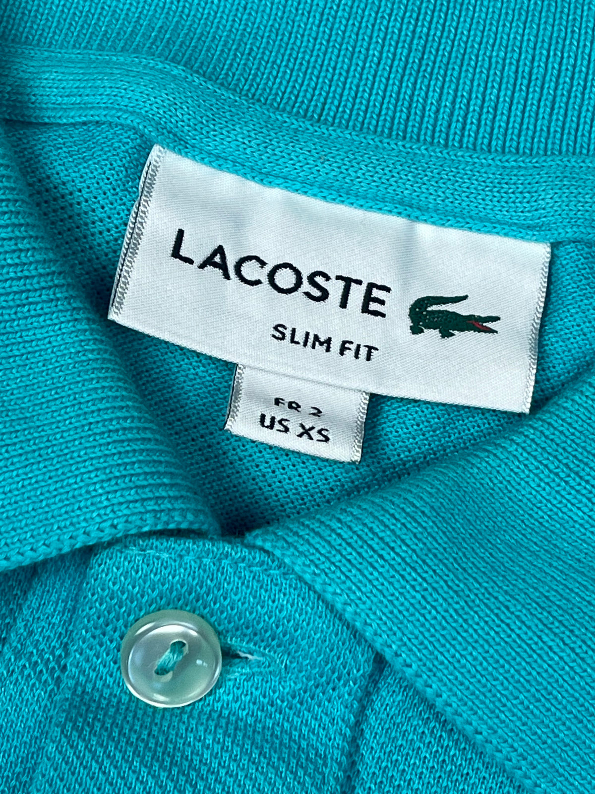 babyblue Lacoste polo {XS}
