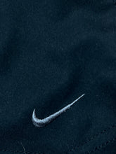 Load image into Gallery viewer, vintage Nike trackpants {M}
