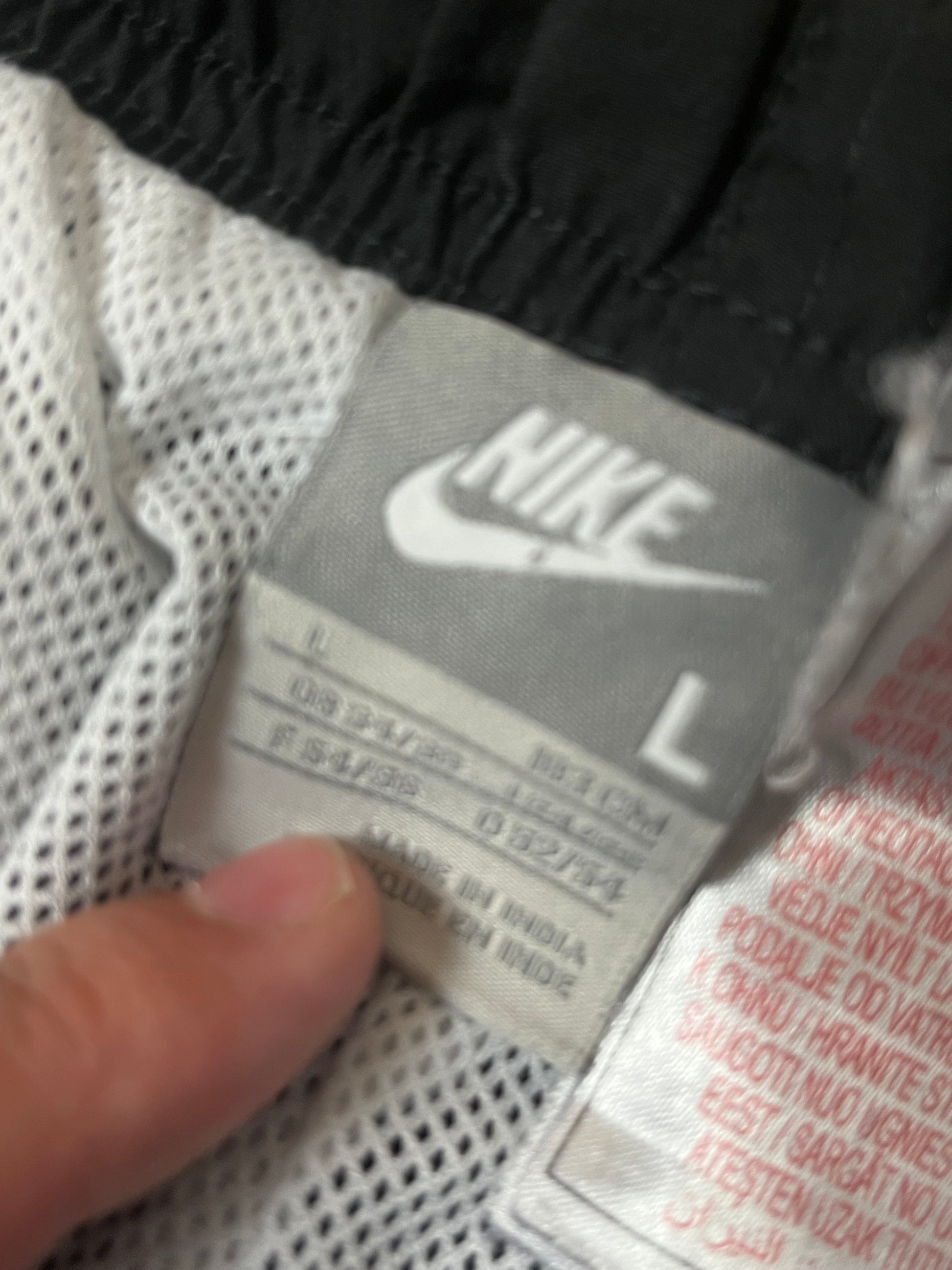 vintage Nike trackpants {L}