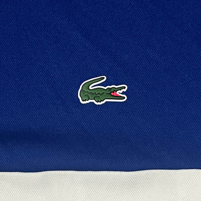 blue/white Lacoste jersey {L}