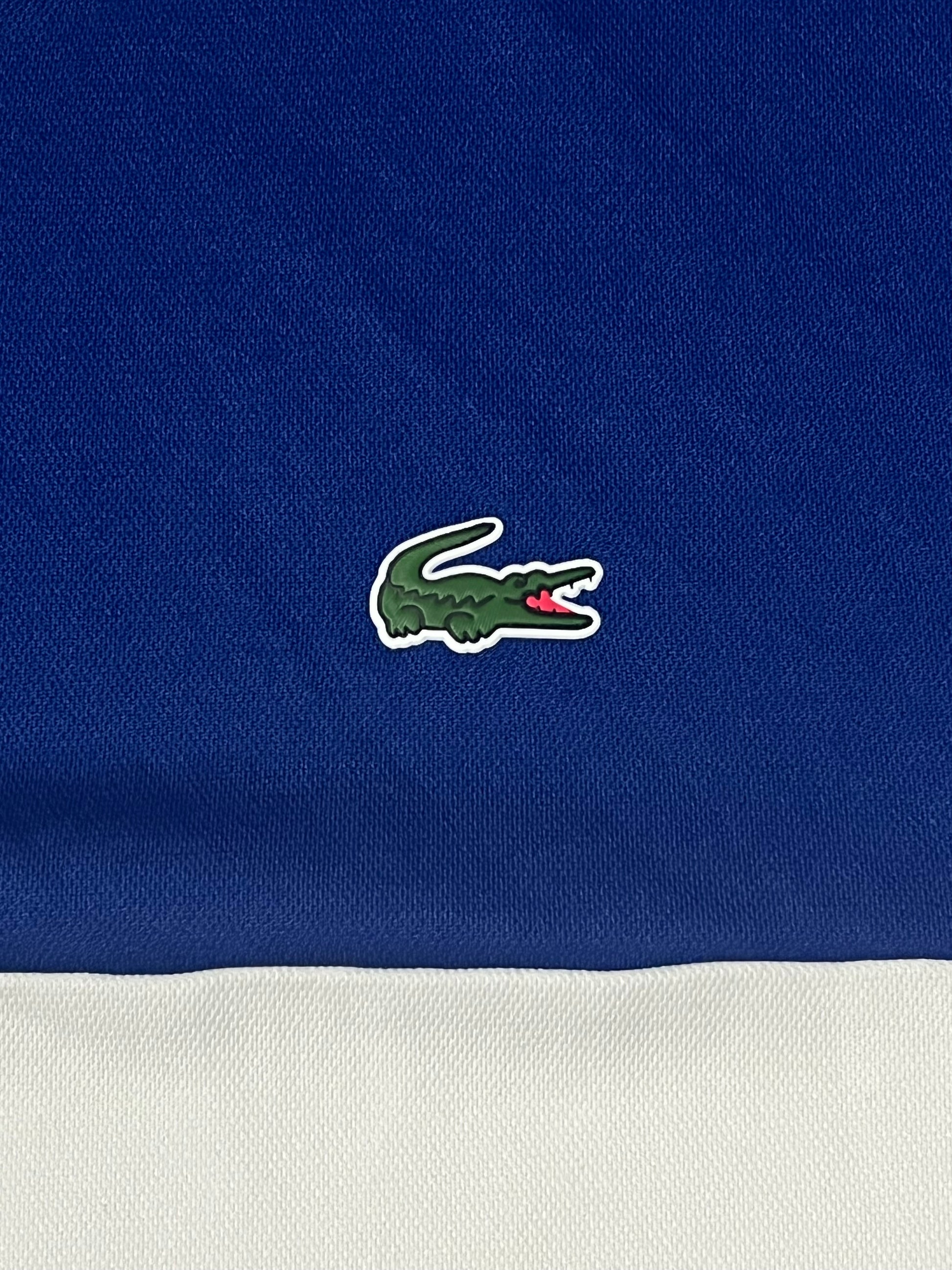 blue/white Lacoste jersey {L}