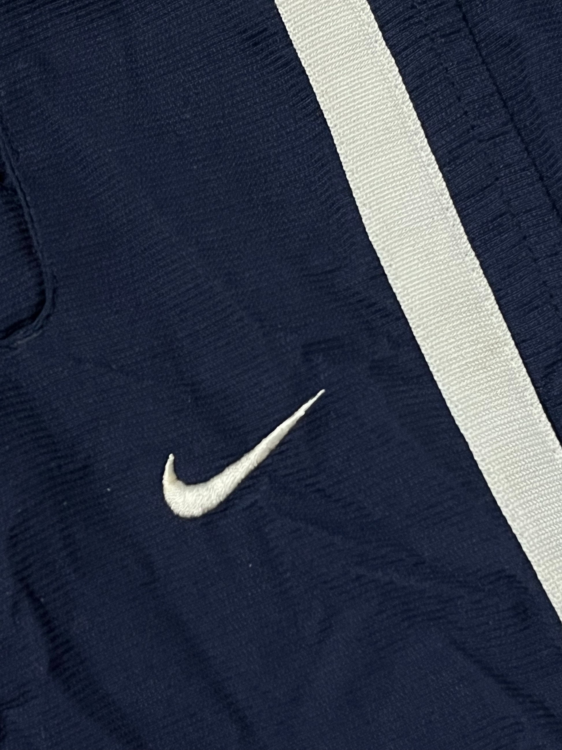 vintage Nike trackpants {L-XL}