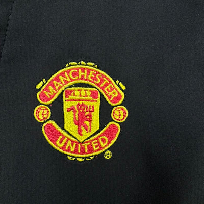 vintage Nike Manchester United trackpants {S}