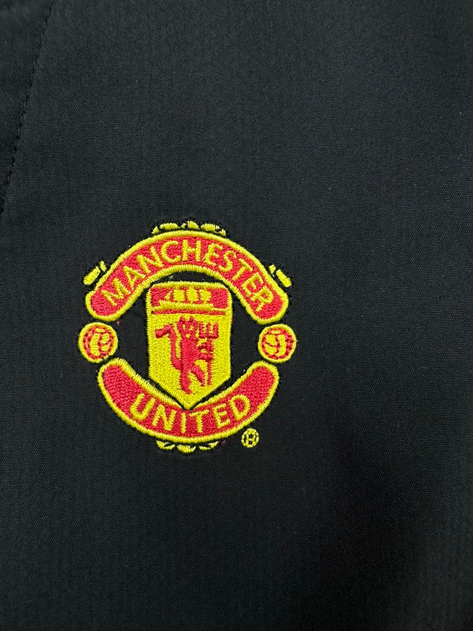vintage Nike Manchester United trackpants {S}