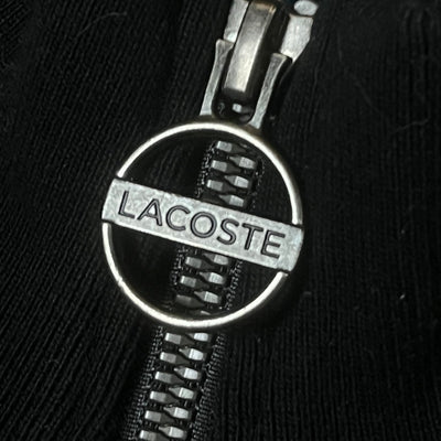 turquoise Lacoste trackjacket {S}