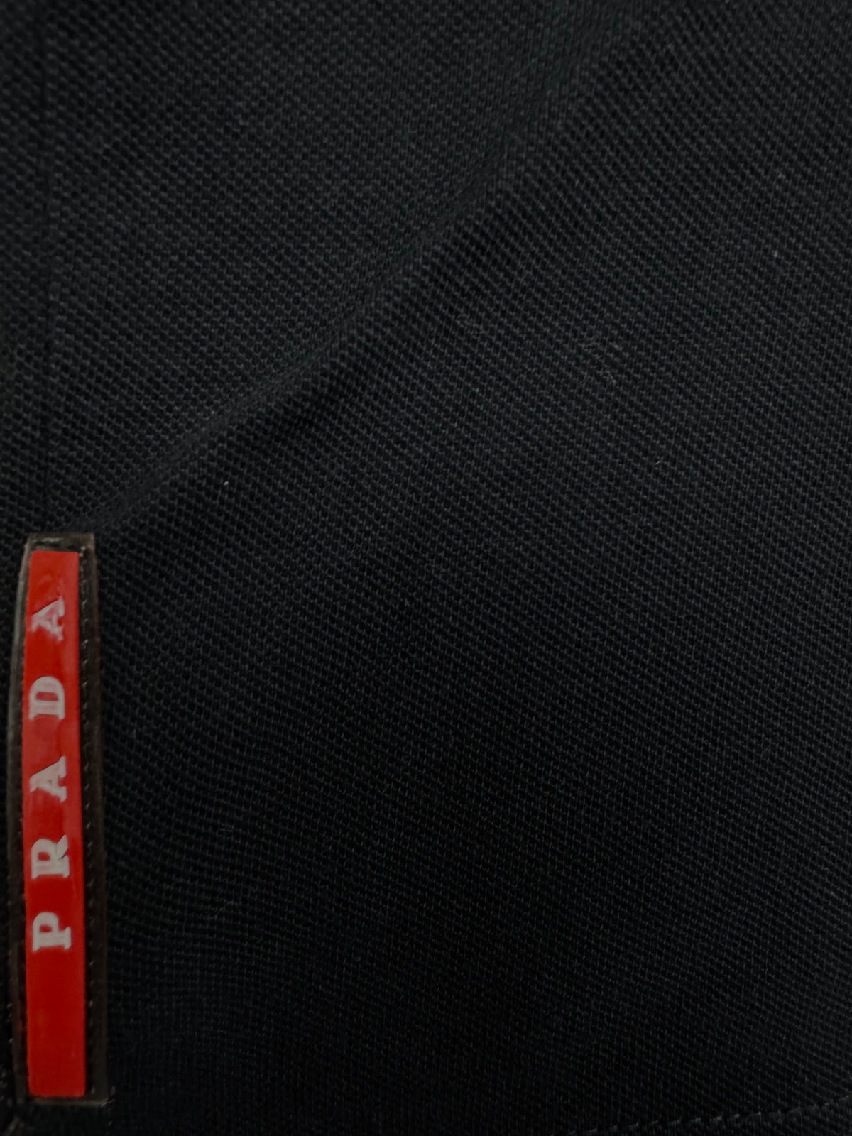 vintage black Prada polo {L}