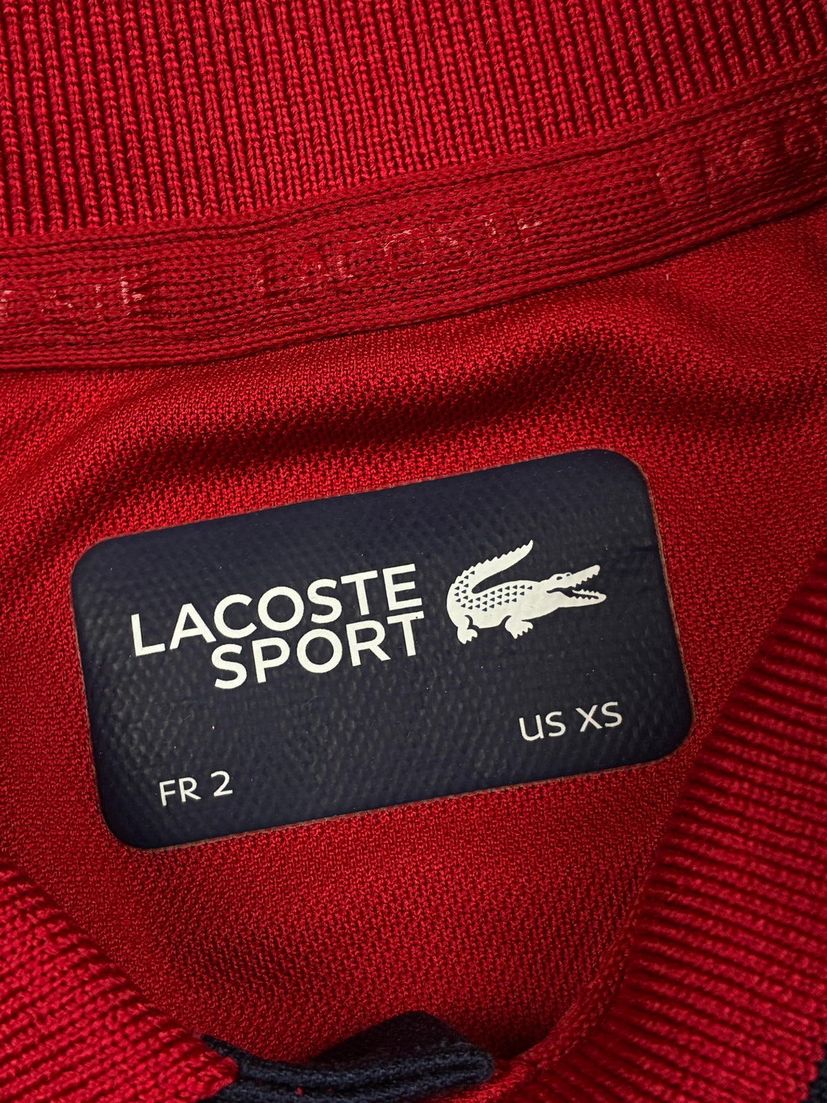 red Lacoste polo {XS}