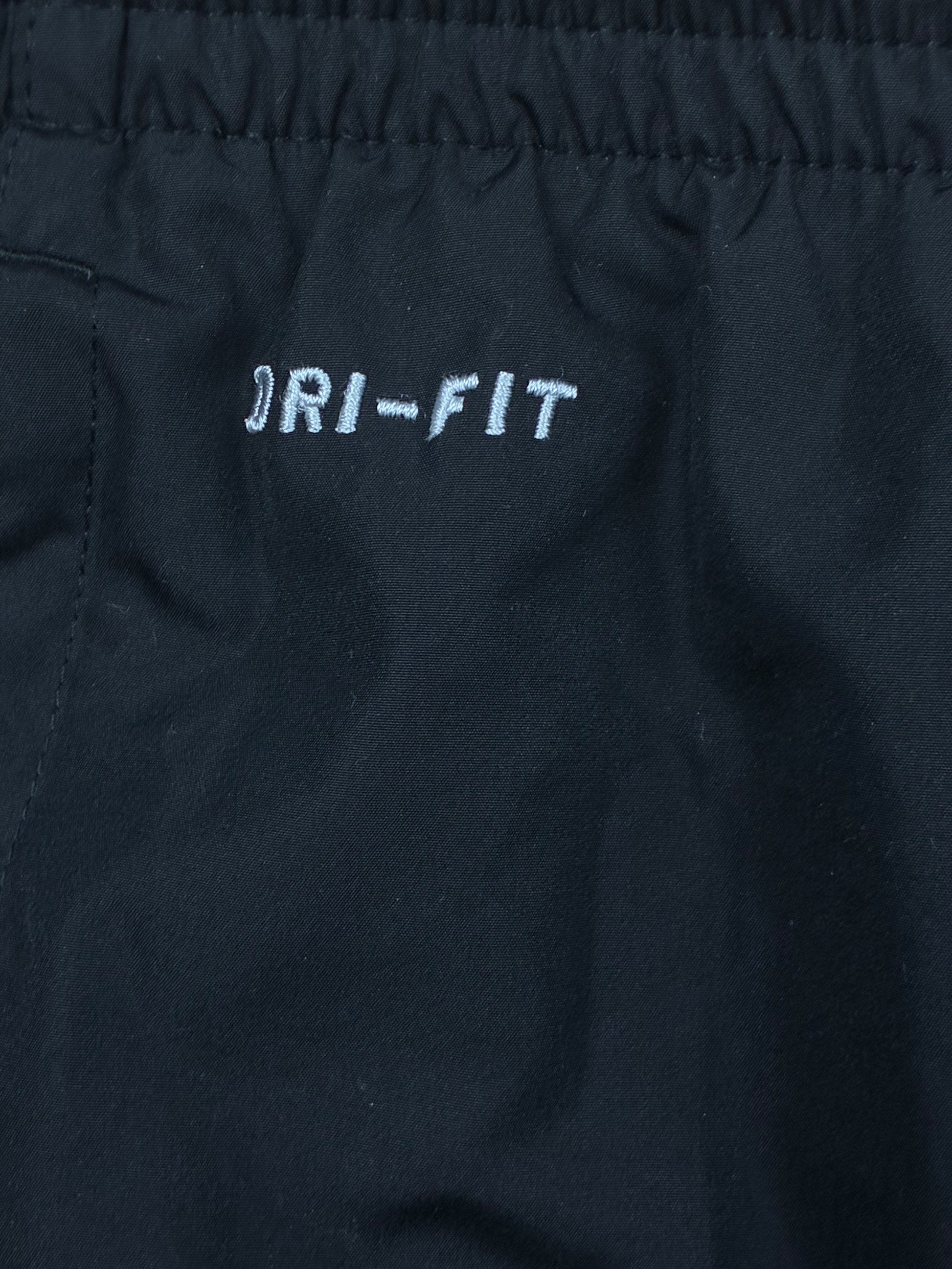 vintage Nike trackpants {M}