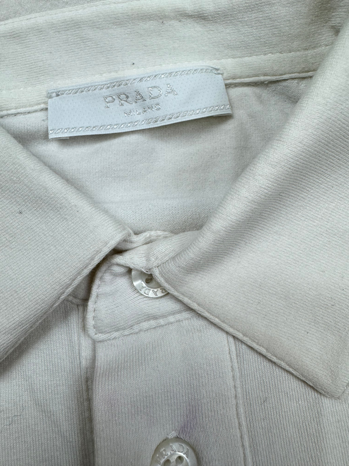 white Prada polo {L}
