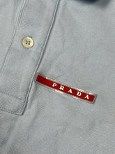 Lade das Bild in den Galerie-Viewer, vintage babyblue Prada polo {S}
