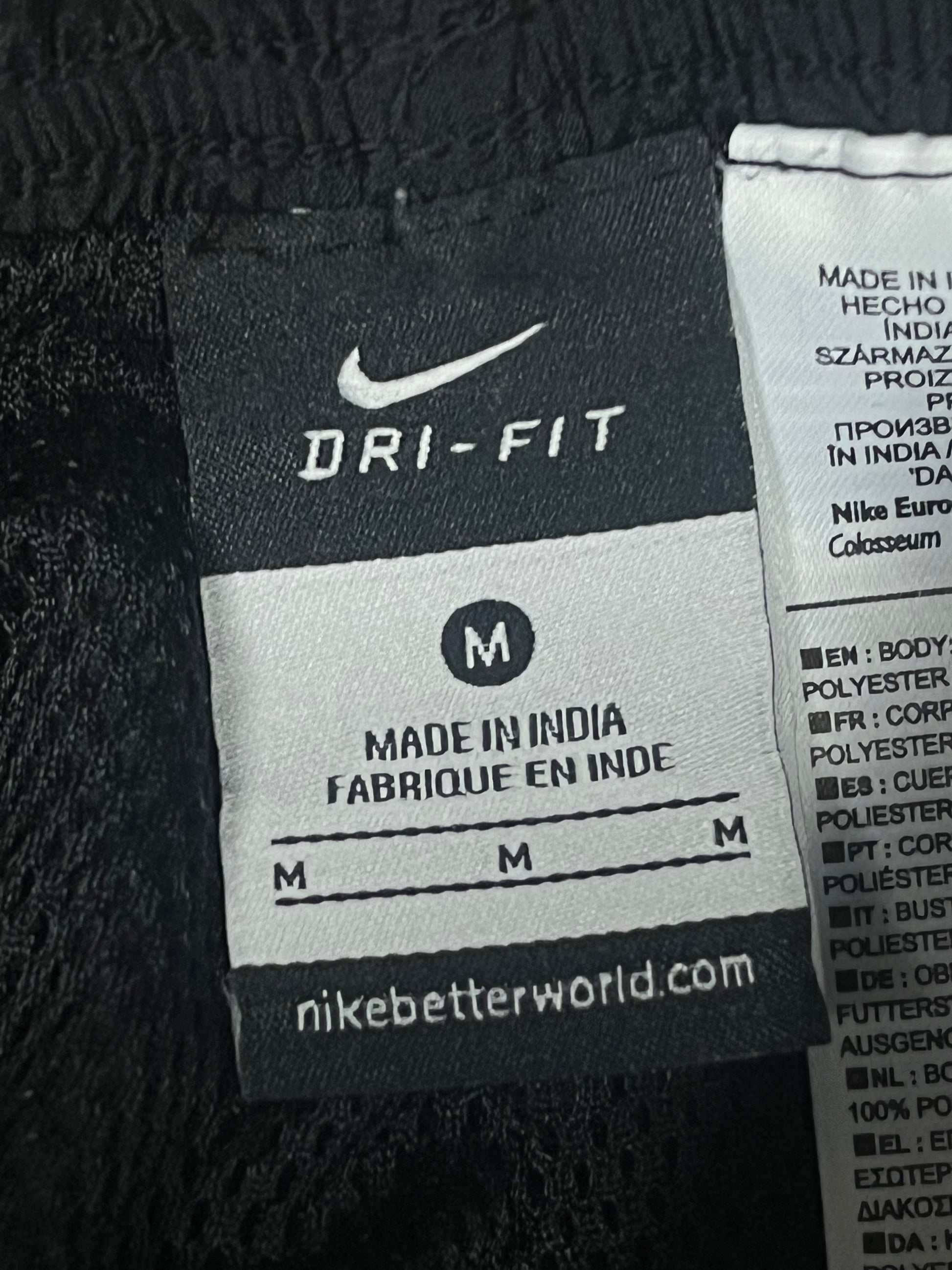 vintage Nike trackpants {M}