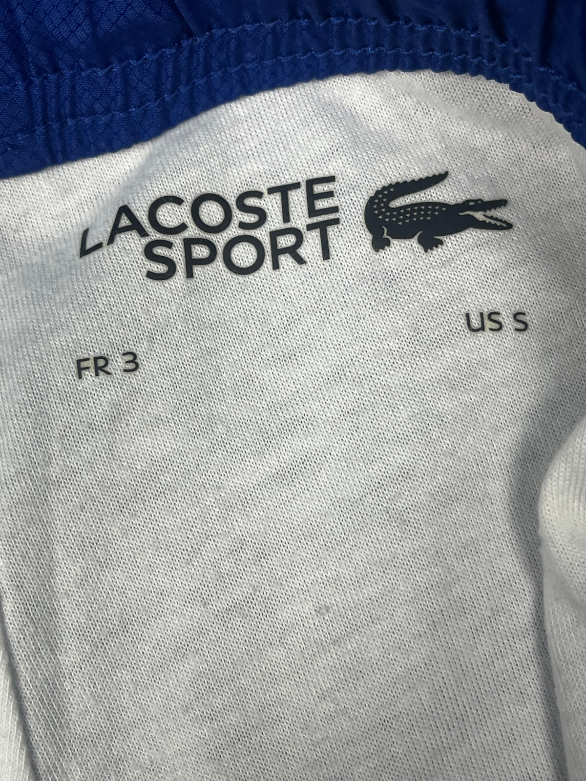 blue Lacoste trackpants {S}