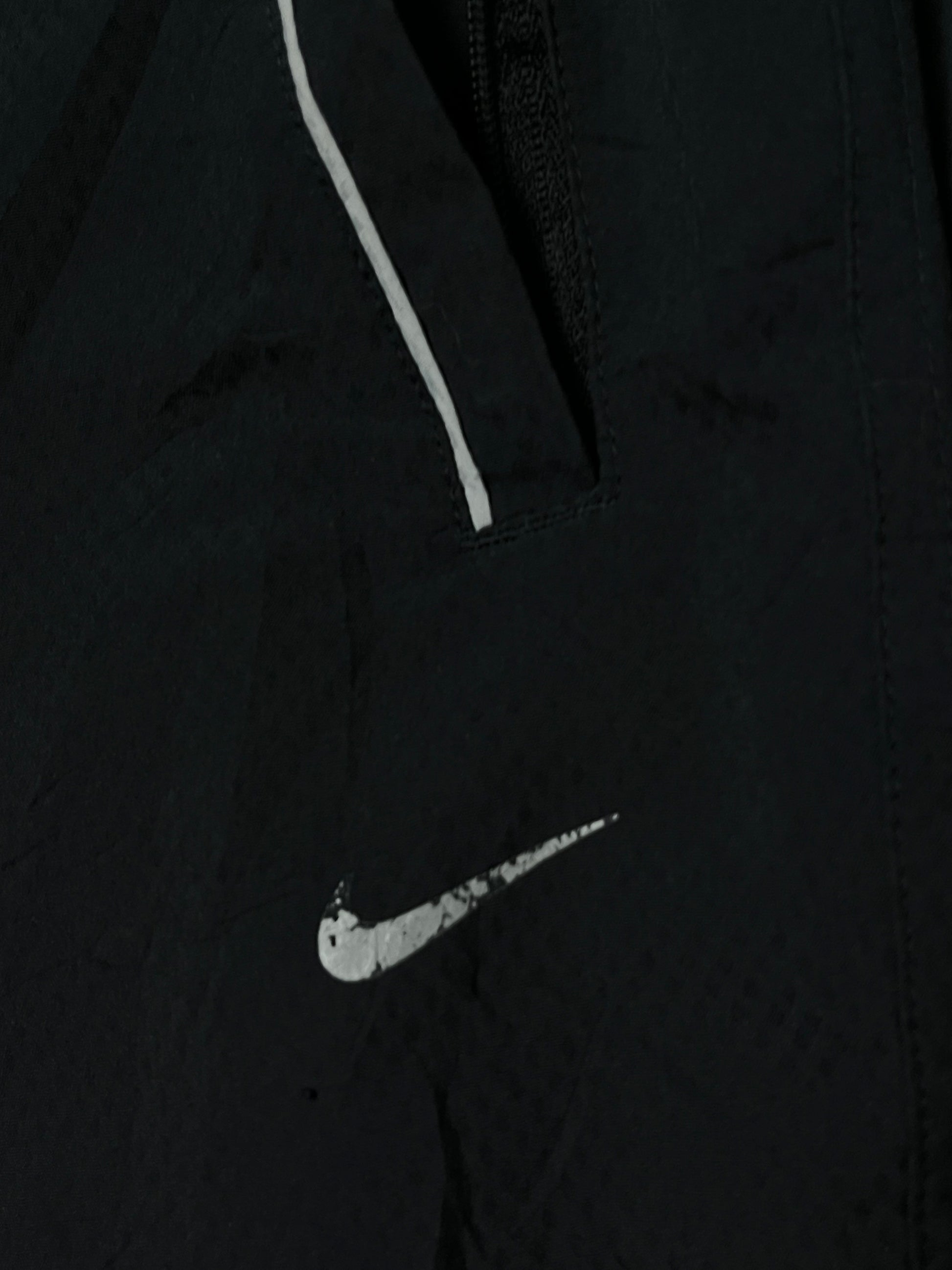 vintage Nike trackpants {M}