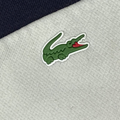 white Lacoste trackjacket {XS}