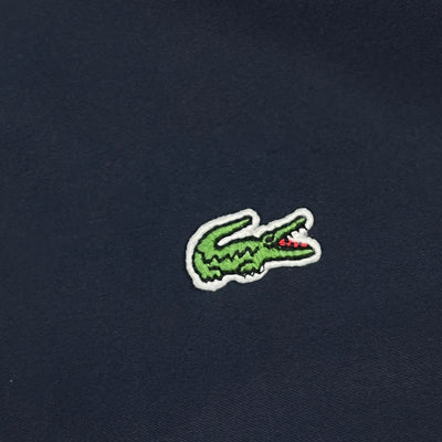 turquoise Lacoste windbreaker {XS}