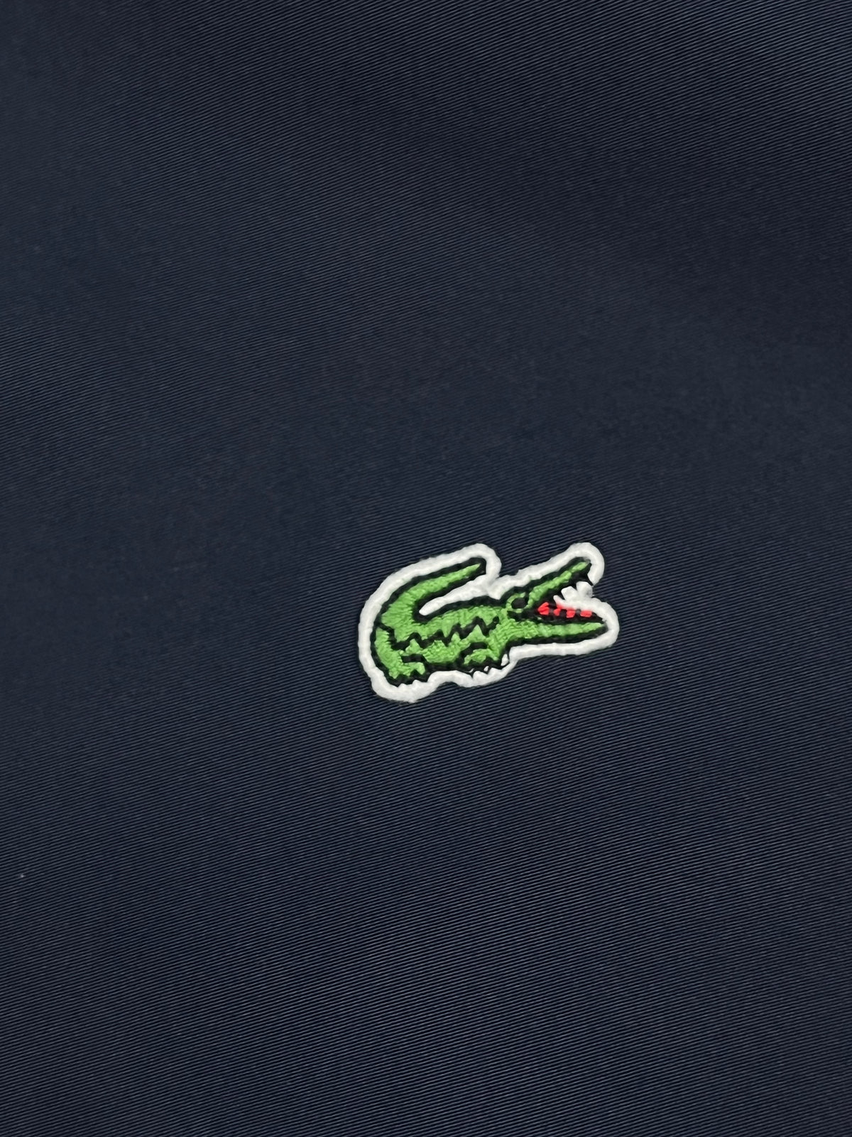 turquoise Lacoste windbreaker {XS}