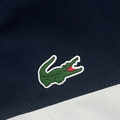 red Lacoste trackjacket {M}