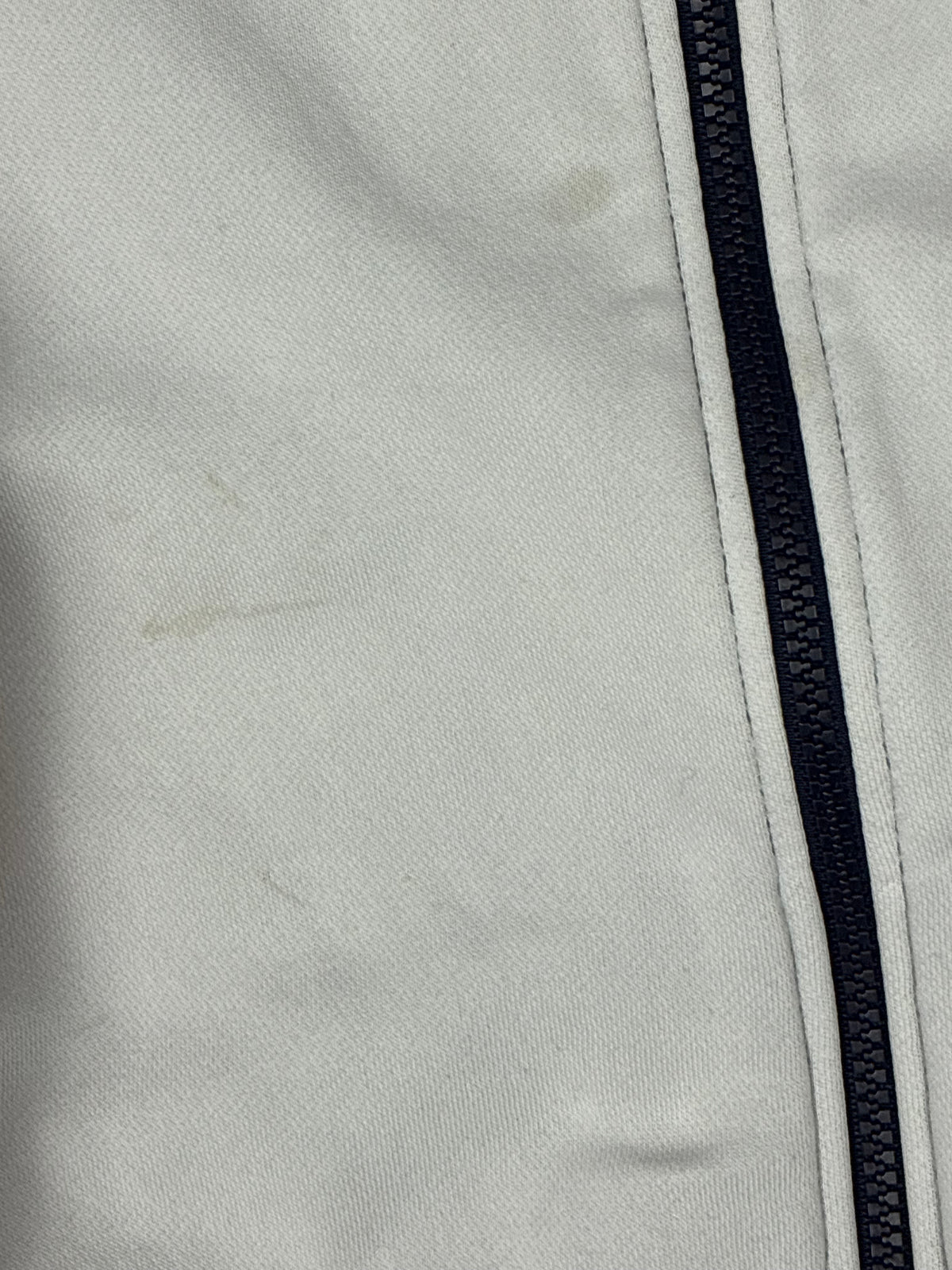 white Lacoste trackjacket {XS}