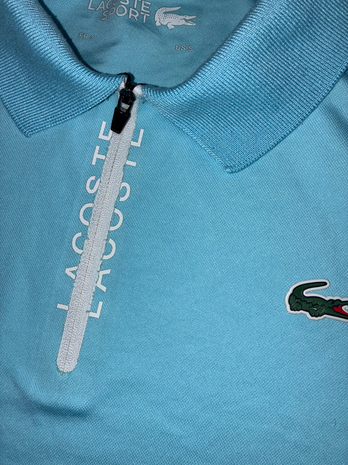 babyblue Lacoste polo {S}