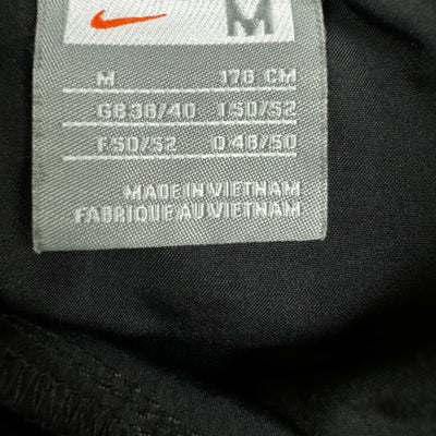 vintage Nike trackpants {M}