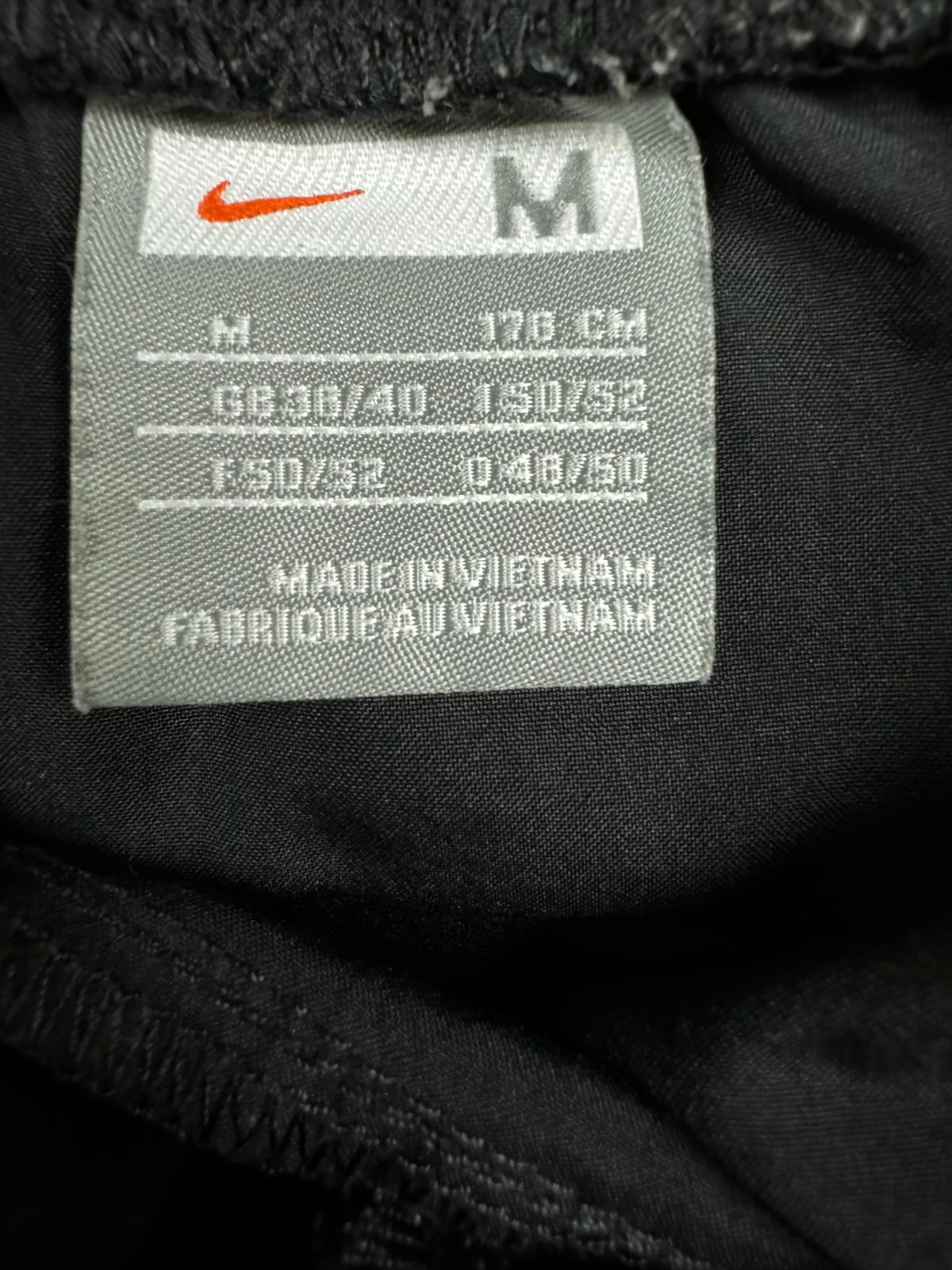 vintage Nike trackpants {M}