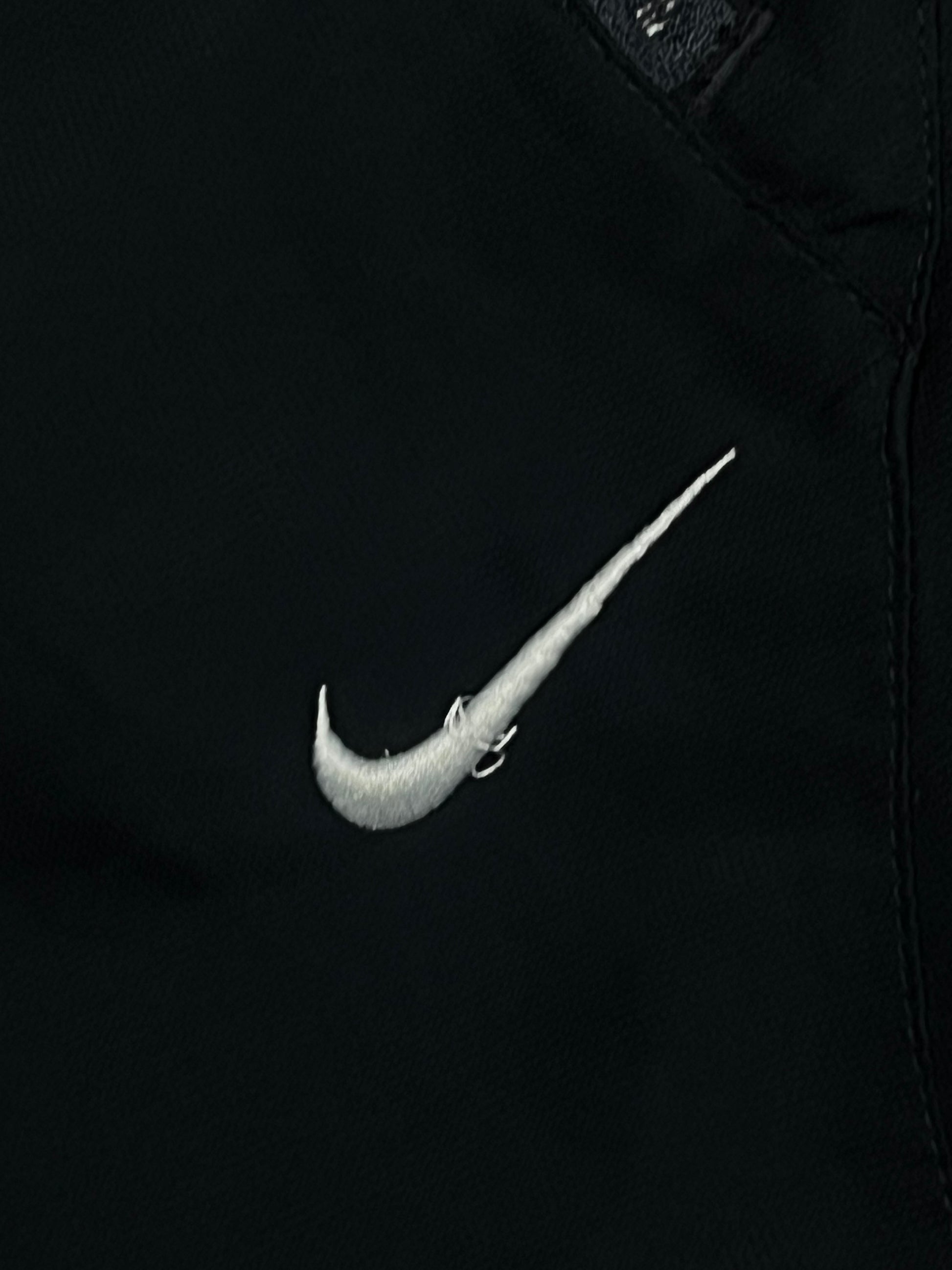 vintage Nike trackpants {L}