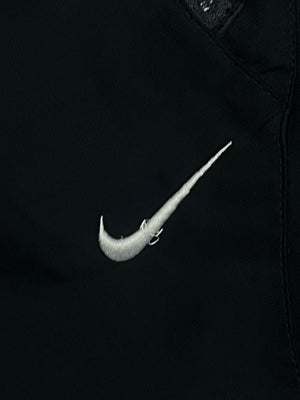 vintage Nike trackpants {L}