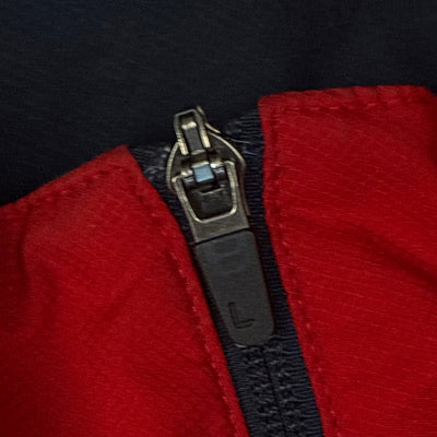 red Lacoste windbreaker {S}