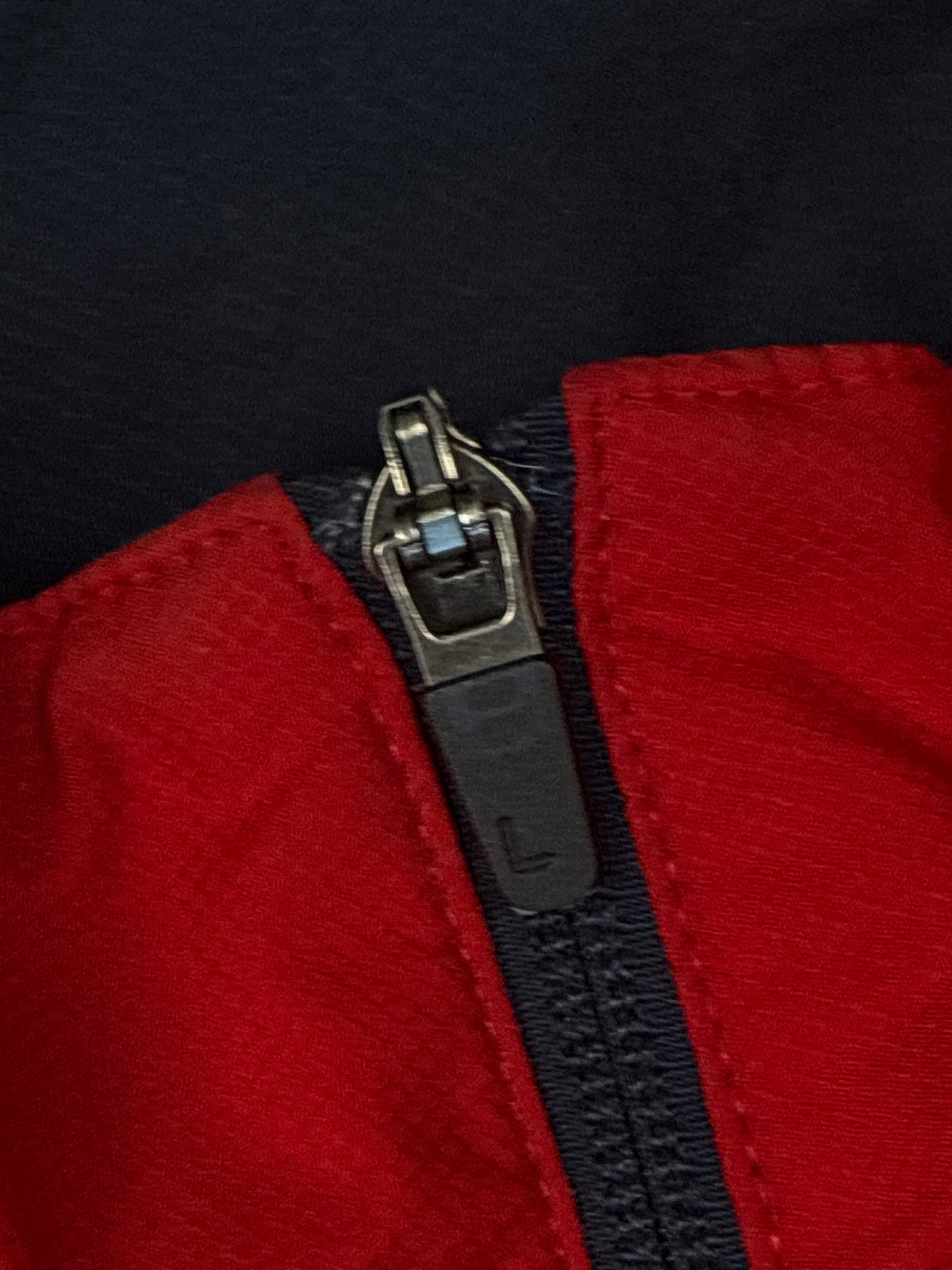 red Lacoste windbreaker {S}