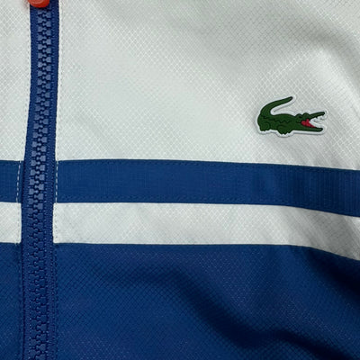 blue Lacoste windbreaker {XS}
