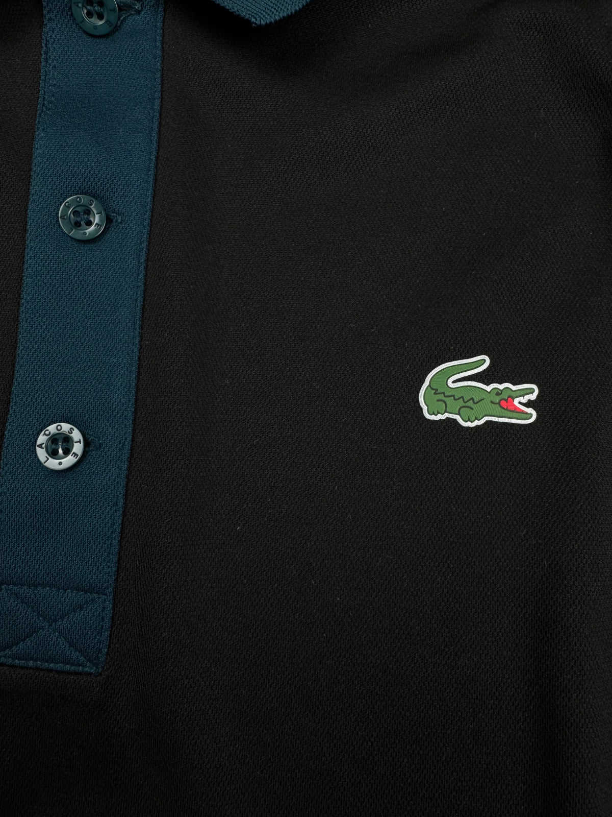 black Lacoste polo {XS}