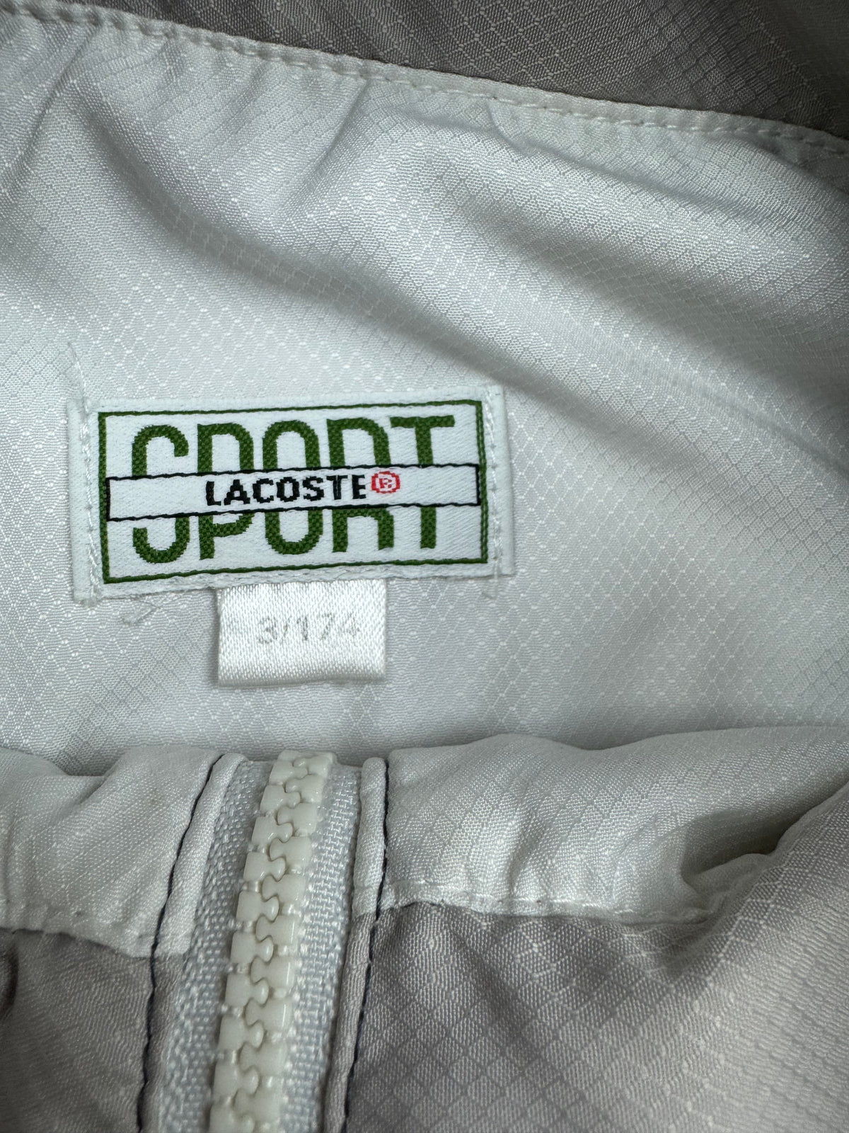 vintage Lacoste windbreaker {L}