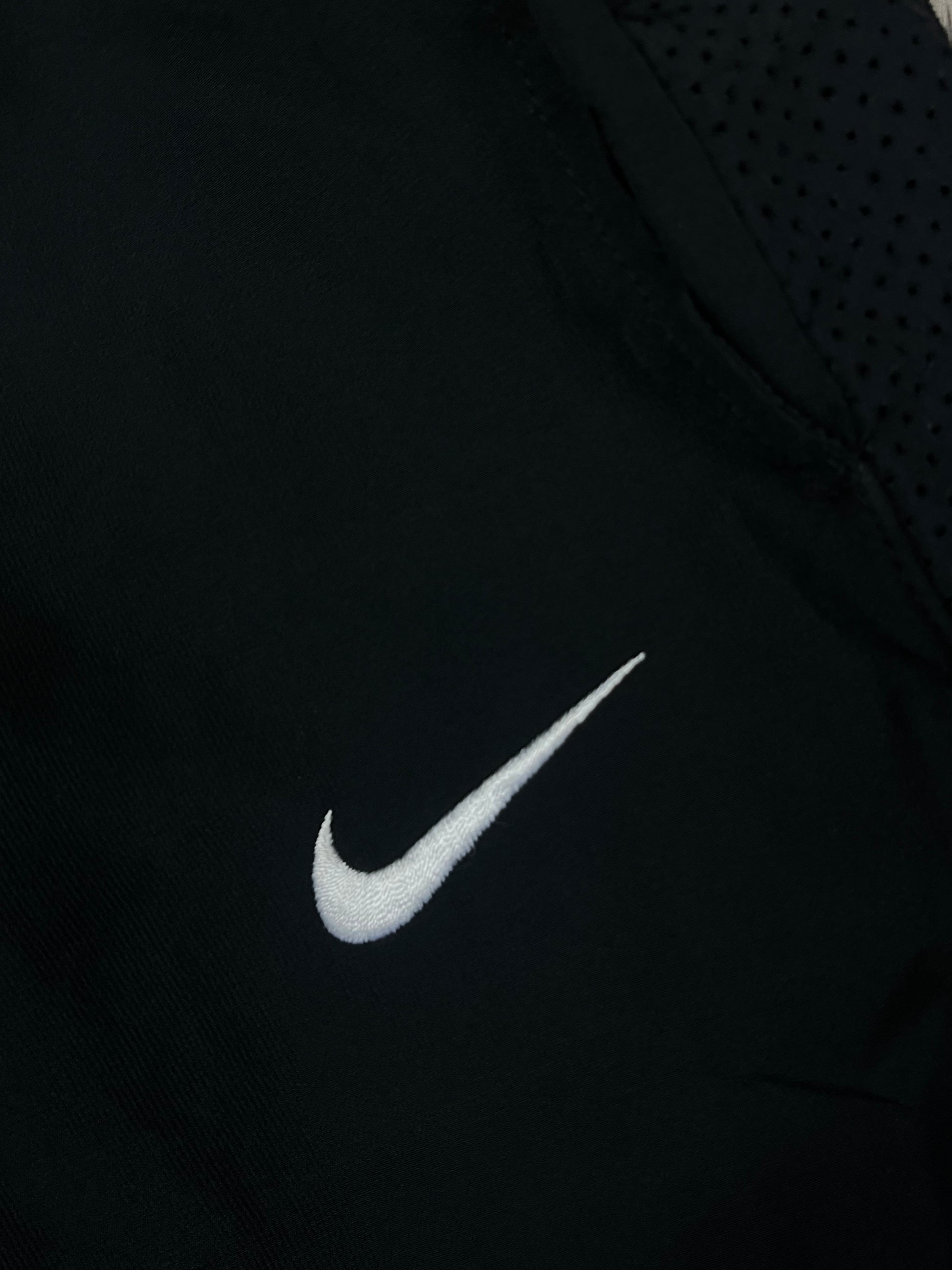 vintage Nike trackpants {M}