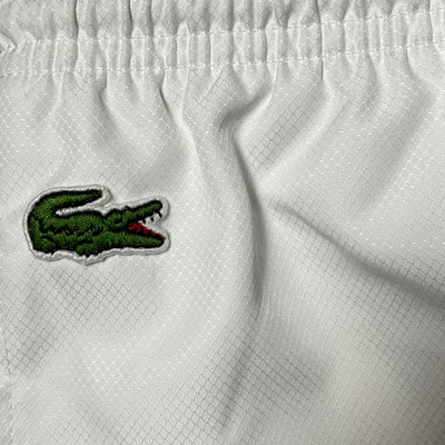 white Lacoste trackpants {M}
