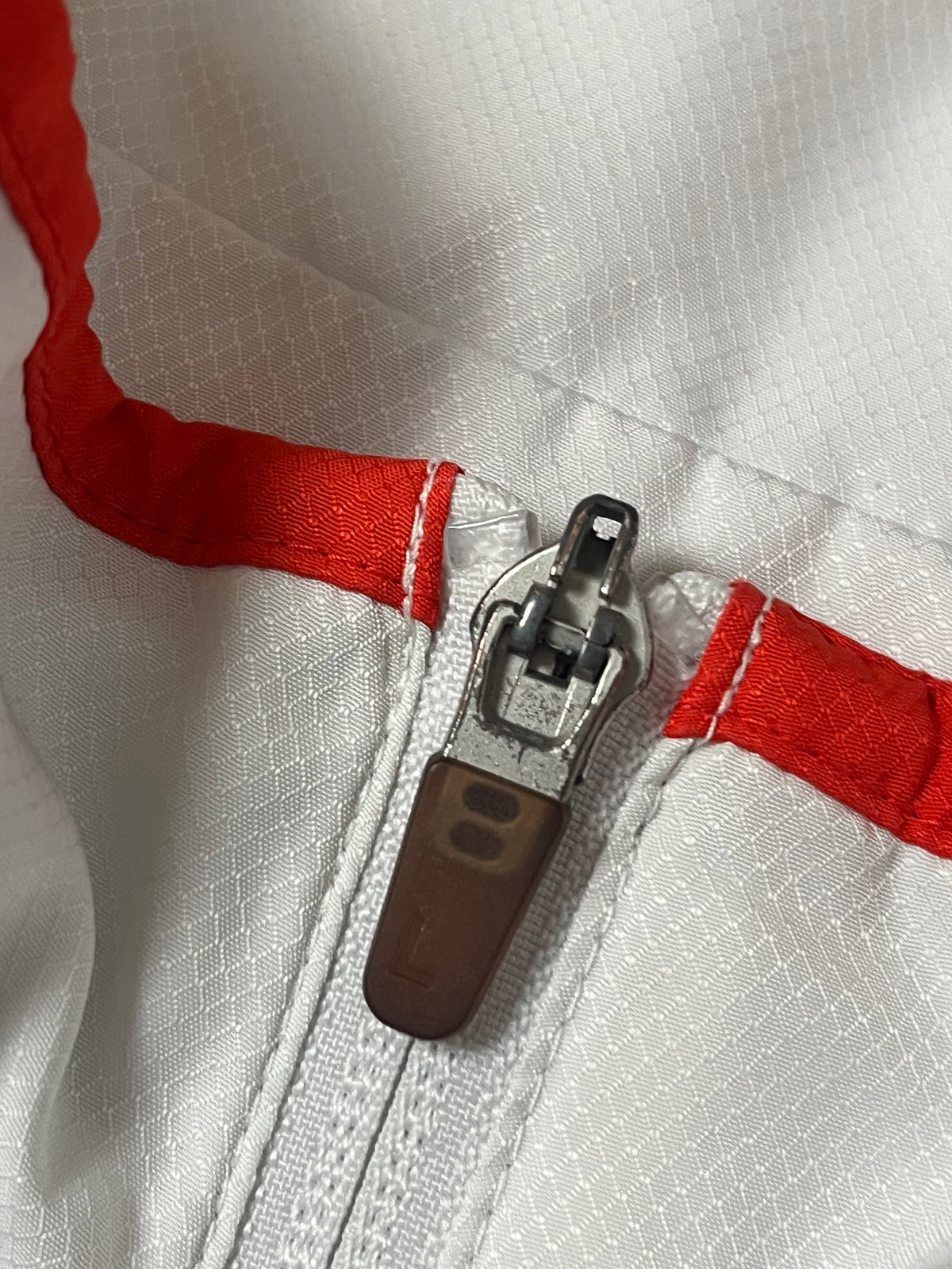 white Lacoste windbreaker {XXL}