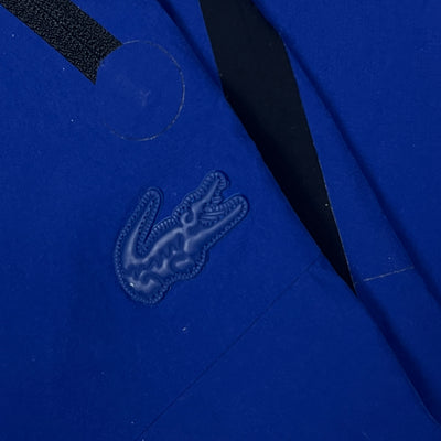 blue Lacoste trackpants {M}