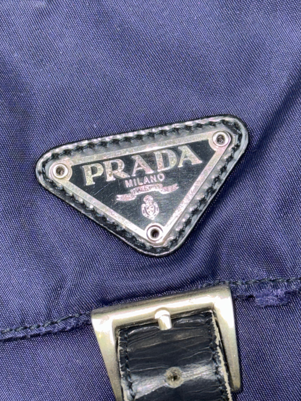 vintage purple Prada slingbag