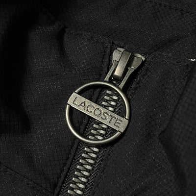turquoise Lacoste windbreaker {L}