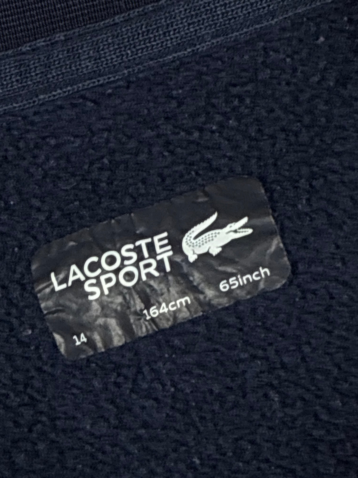 white Lacoste trackjacket {XS}
