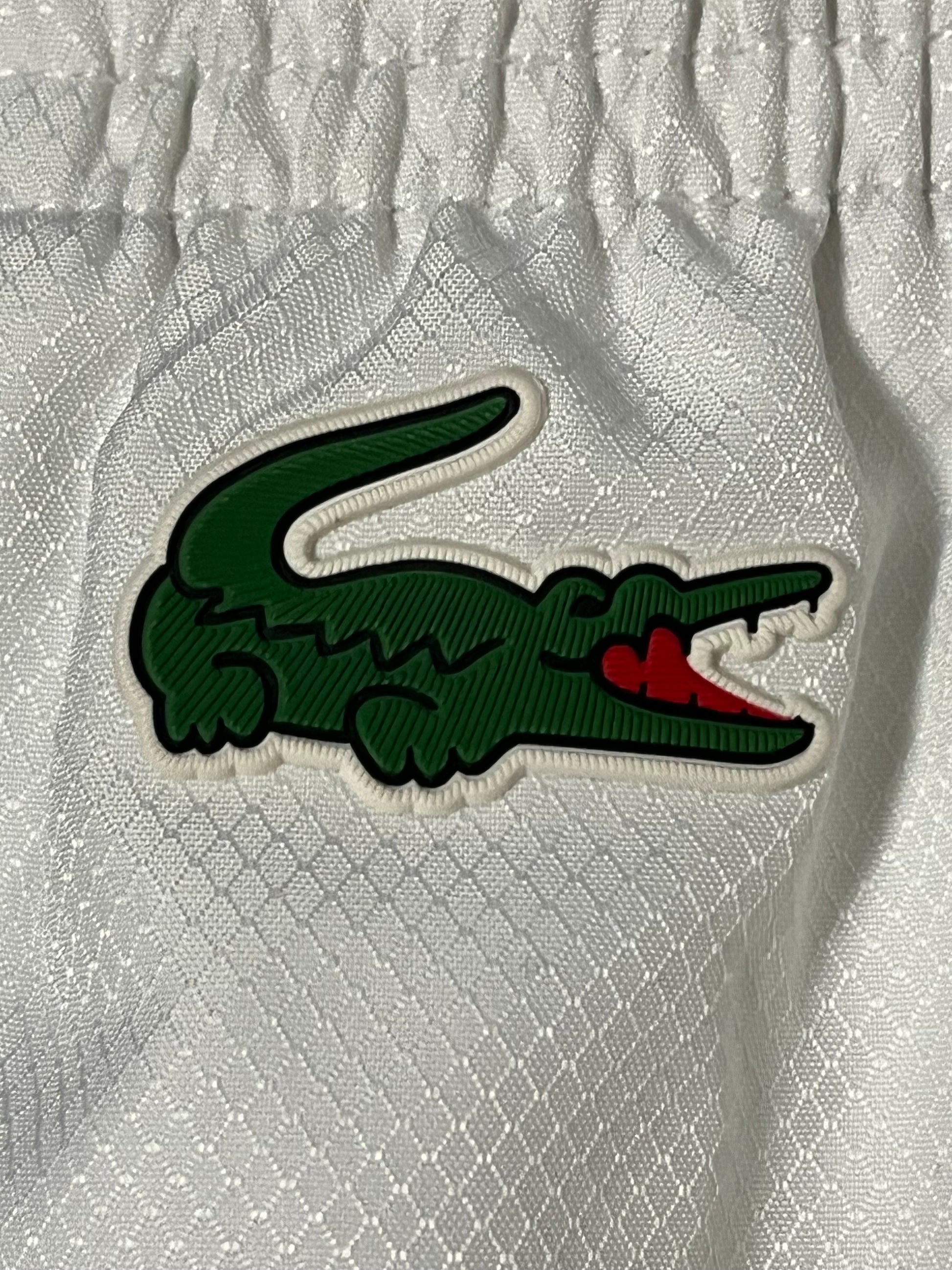 white/black Lacoste trackpants {L}