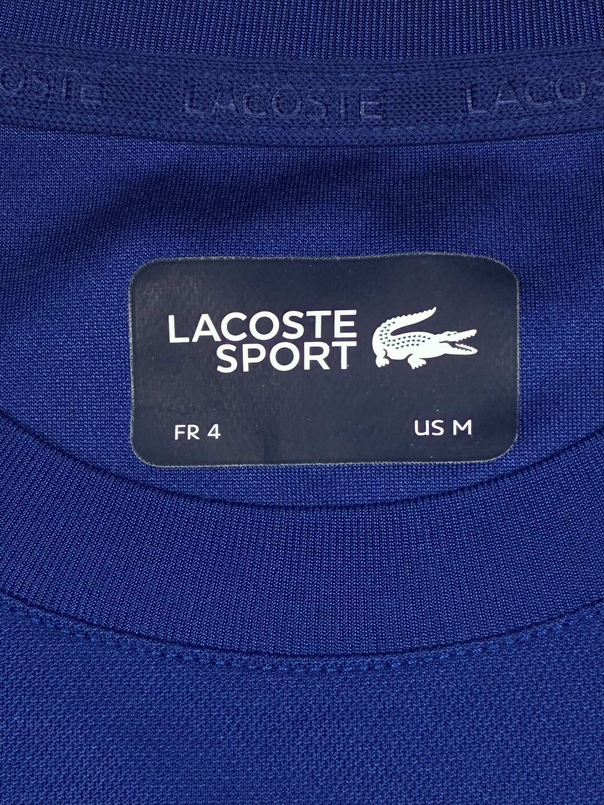 blue Lacoste jersey {M}