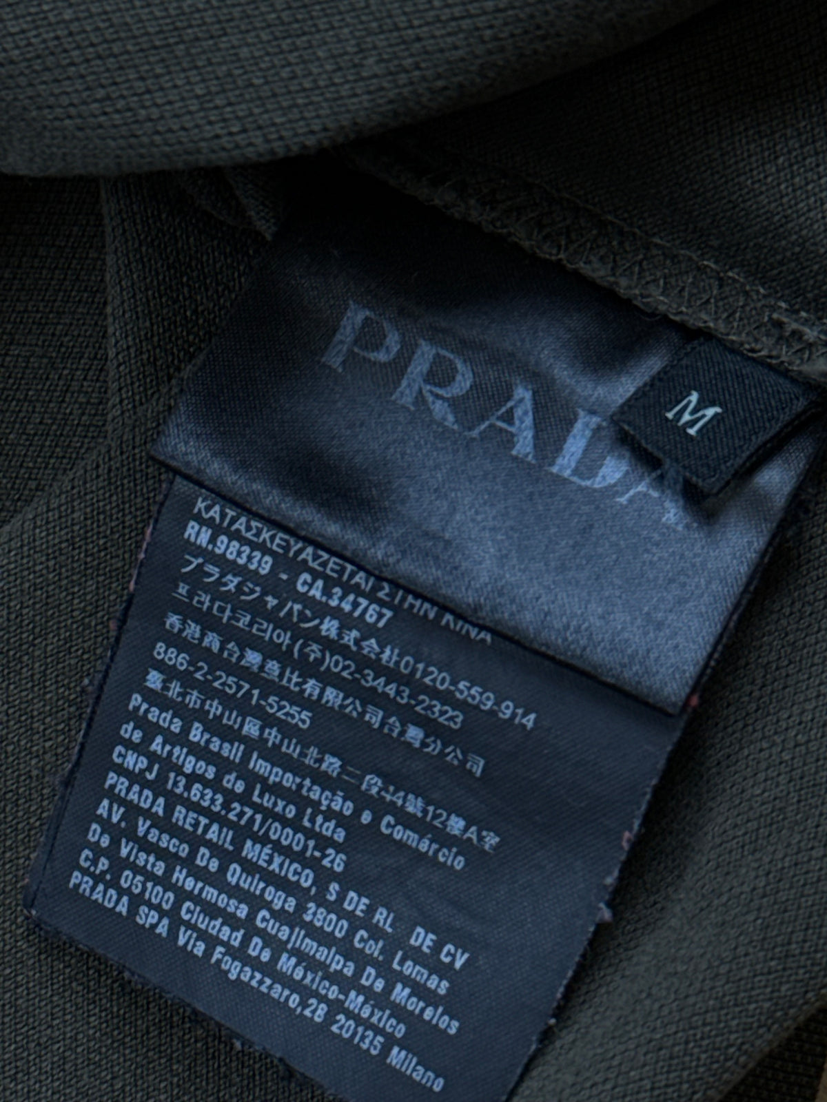 khaki Prada polo {M}