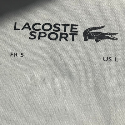 blue/white Lacoste jersey {L}