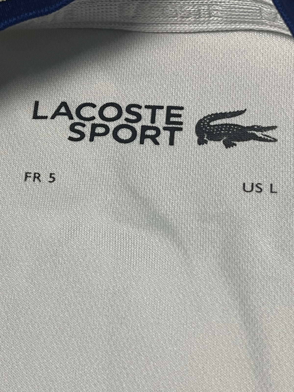 blue/white Lacoste jersey {L}